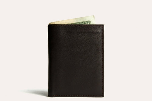 Craques slim passcase wallet for men in dark brown leather with cash peeking out