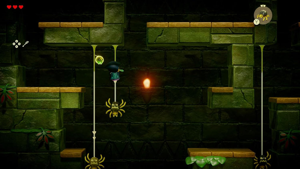 Gameplay scene of Legend of Zelda Echoes of Wisdom Switch showing character climbing a rope inside a dungeon