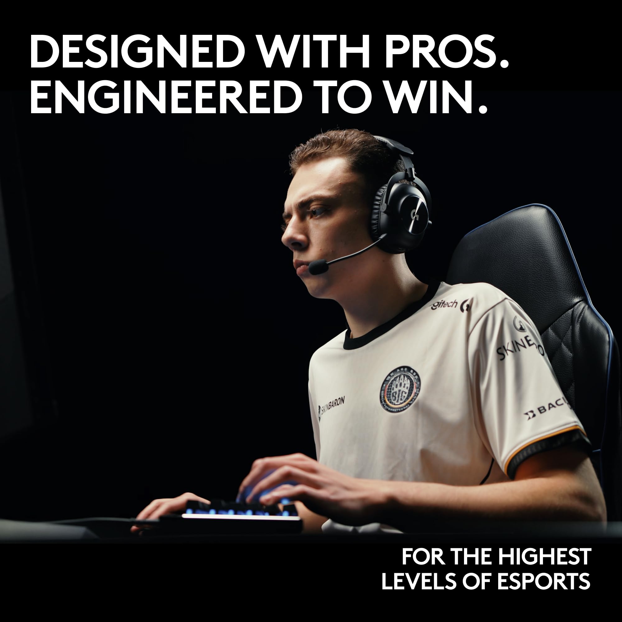 Gamer wearing Logitech G PRO X gaming headset focused on playing esports in a professional setup