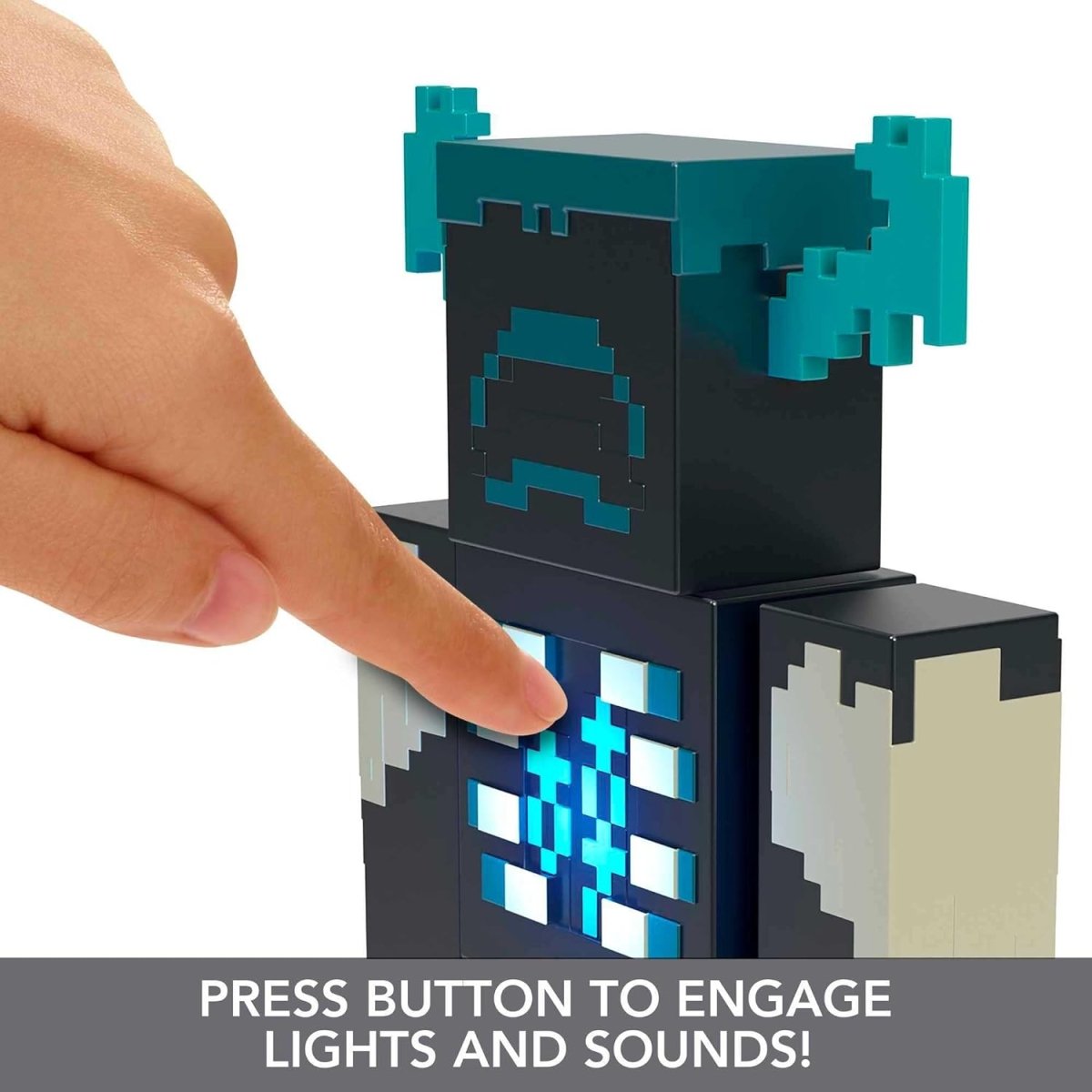 Minecraft Warden action figure with light-up and sound features being activated by a pressing finger