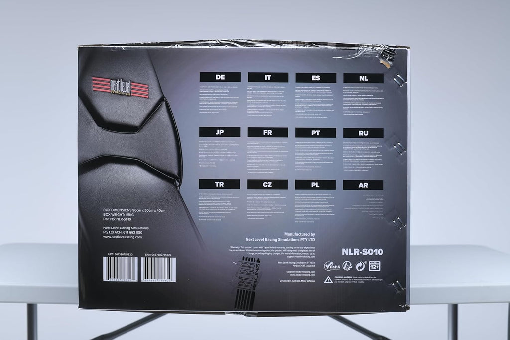 Packaging box for Next Level Racing F-GT simulator cockpit showing multilingual product details and barcodes