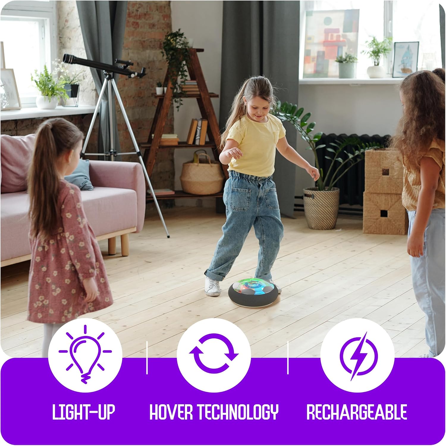 Kids playing with a light-up hover soccer ball for kids featuring hover technology and rechargeable battery indoors