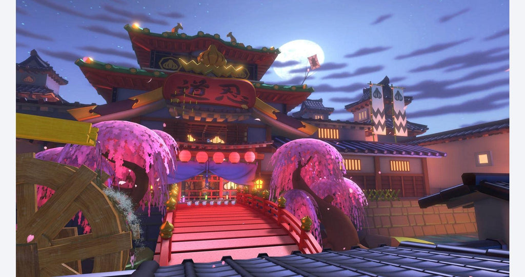 Mario Kart 8 Deluxe Nintendo Switch screenshot of a vibrant Japanese-themed racetrack with cherry blossoms and traditional architecture