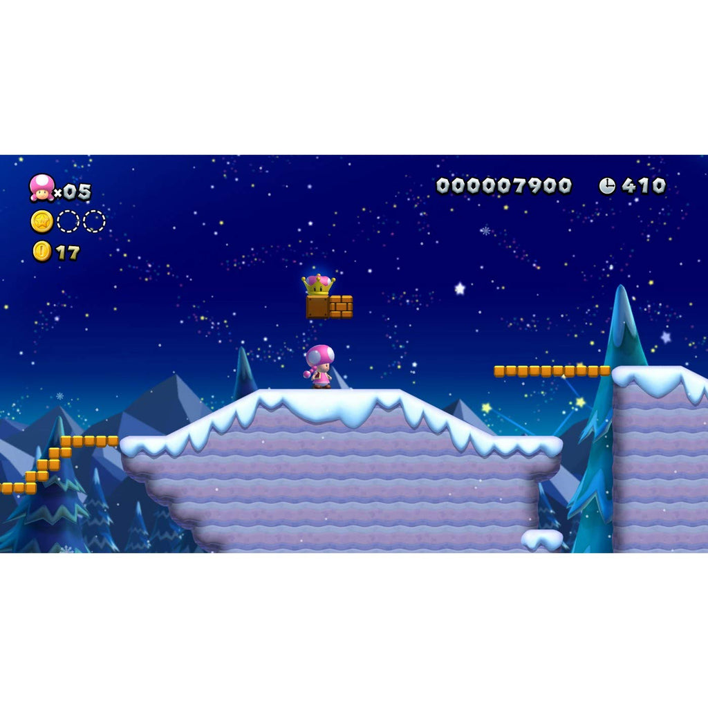 Gameplay screenshot of Super Mario Bros U Deluxe Switch featuring Toadette on snowy platform at night