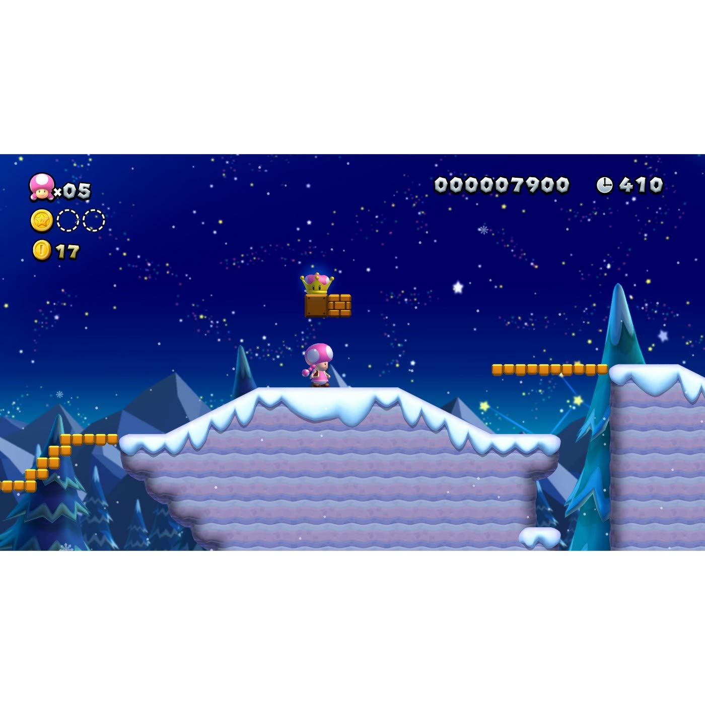 Gameplay screenshot of Super Mario Bros U Deluxe Switch featuring Toadette on snowy platform at night