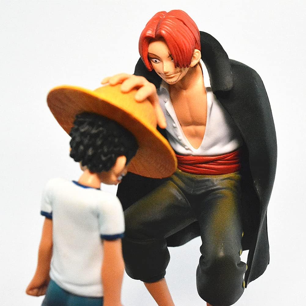 One Piece Shanks and Luffy action figure showing Shanks placing hand on Luffy's straw hat