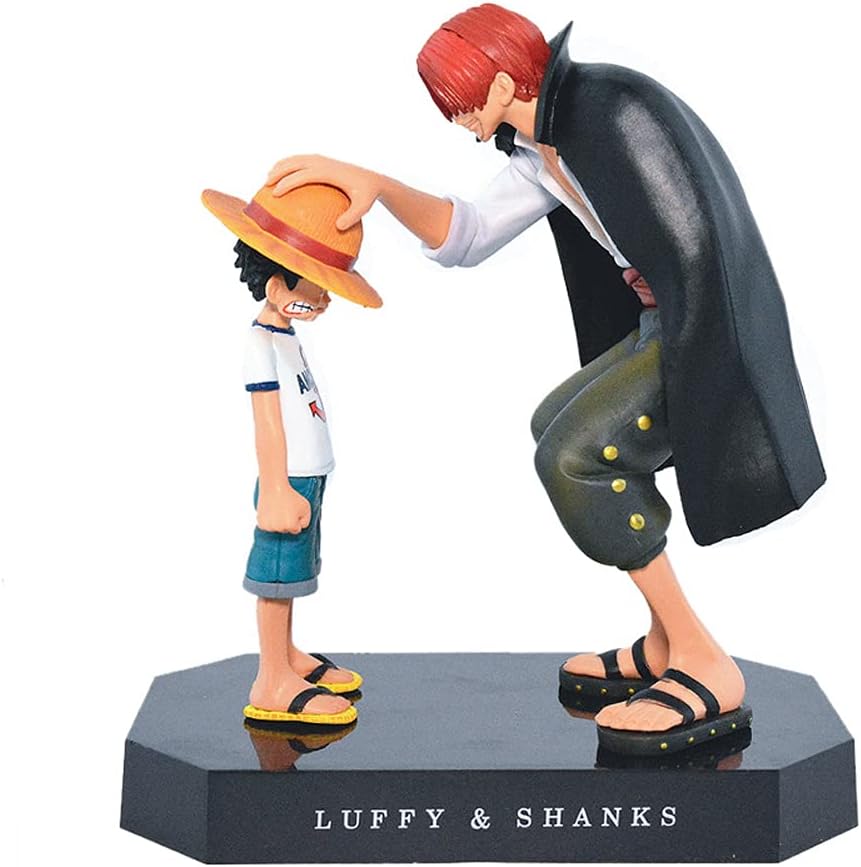 One Piece Shanks and Luffy action figure showing Shanks placing his hand on young Luffy's hat on a display base