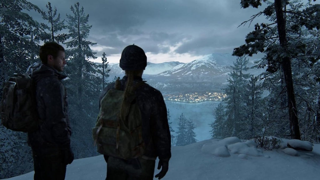 The Last of Us Part II Remastered PS5 game scene showing two characters overlooking a snowy landscape with mountains and a village