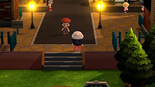 Gameplay scene from Pokémon Legends Arceus Nintendo Switch showing characters in a village at night
