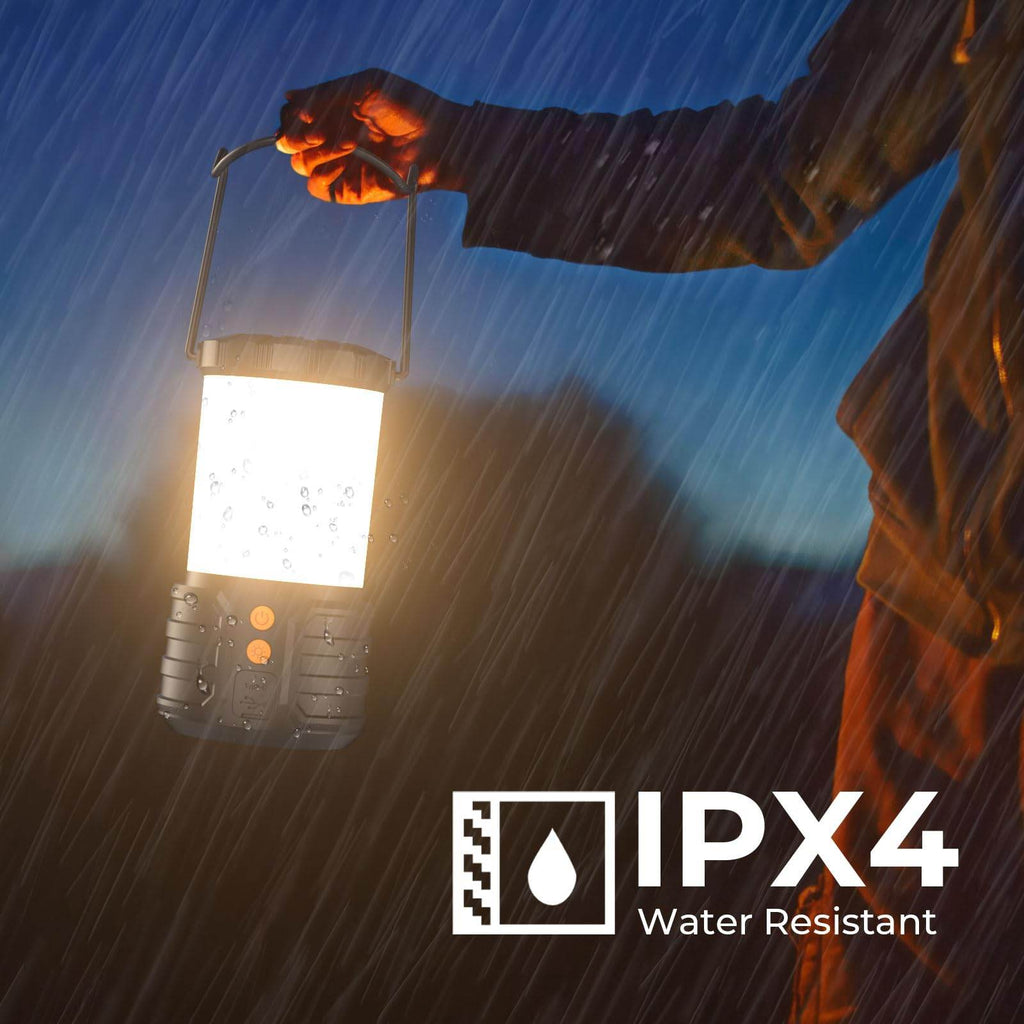 Craques rechargeable camping lanterns held in hand under rain showing IPX4 water resistance