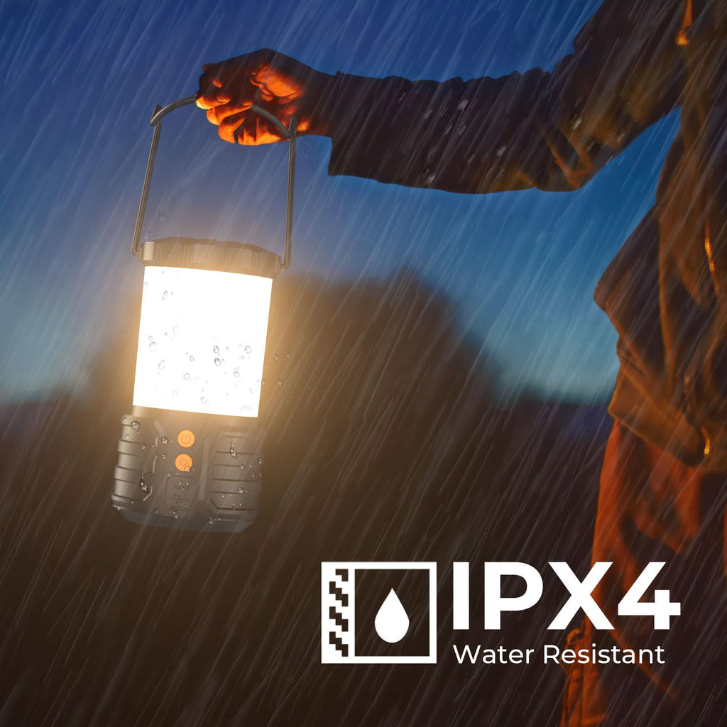 Craques rechargeable camping lanterns held in rain with IPX4 water resistant rating glowing bright