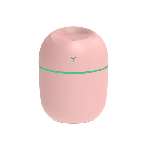 Portable ultrasonic humidifier in pink color with sleek design for improved air quality