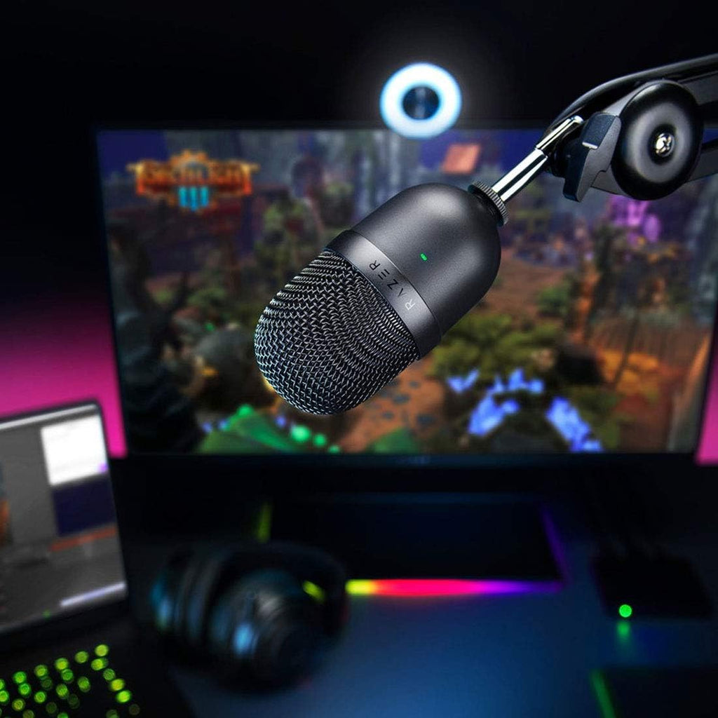 Seiren Mini USB condenser microphone mounted on an adjustable arm in a gaming and streaming setup