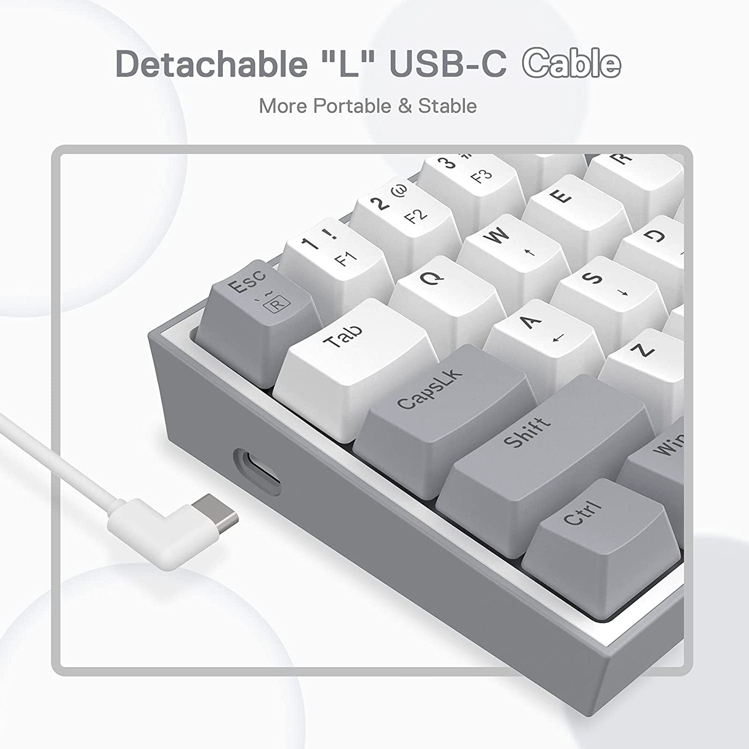Craques 60% mechanical gaming keyboard with detachable L-shaped USB-C cable in gray and white keys