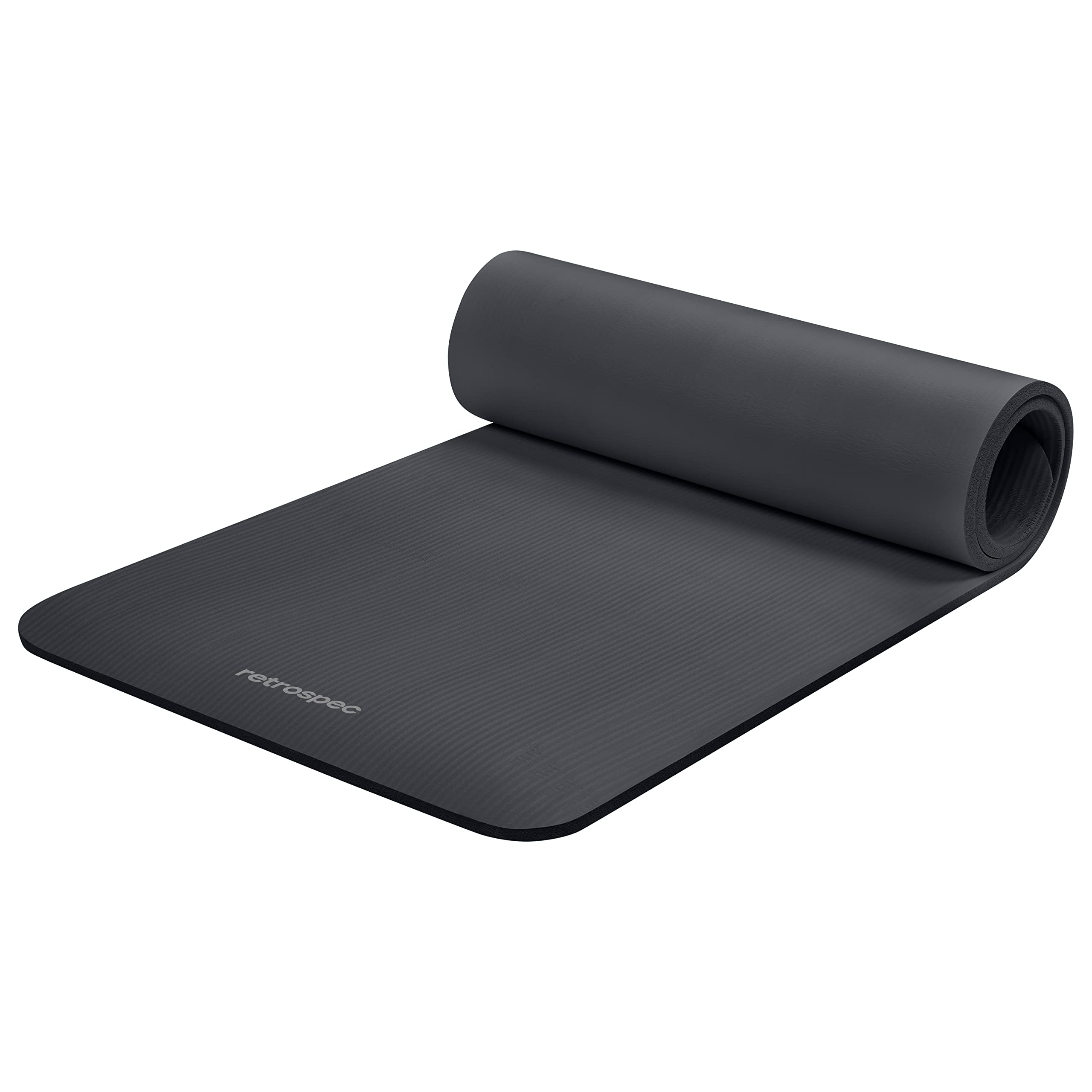 Black Retrospec Solana yoga mat partially rolled with textured surface for home workouts