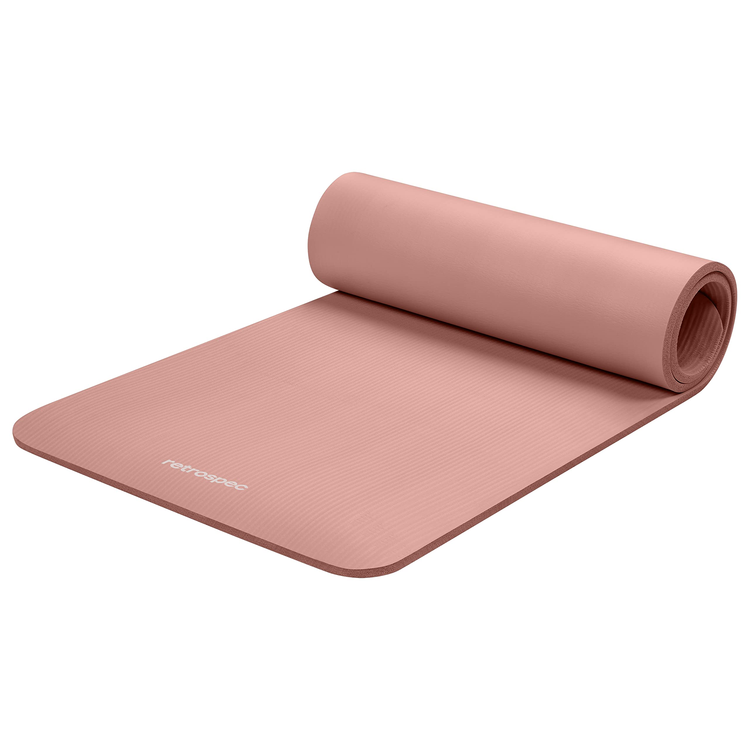 Pink Retrospec Solana yoga mat partially rolled with textured surface for exercise and yoga