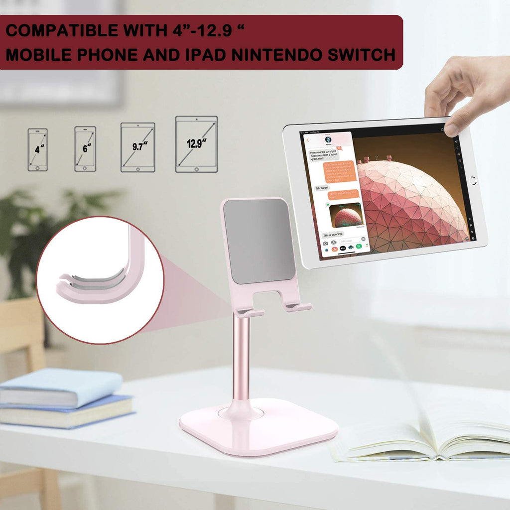 Craques adjustable cell phone stand for desk in pink holding a tablet on a white office desk