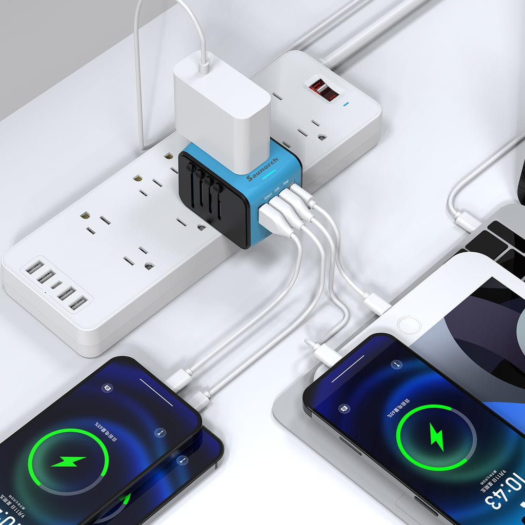 Craques universal travel adapter with USB C powering multiple devices connected to power strips and smartphones