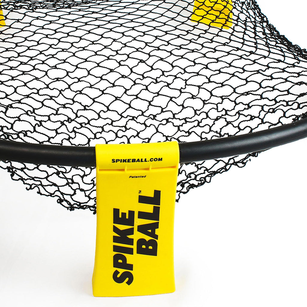Close-up of black and yellow Spikeball game set net with branded yellow tag and black frame