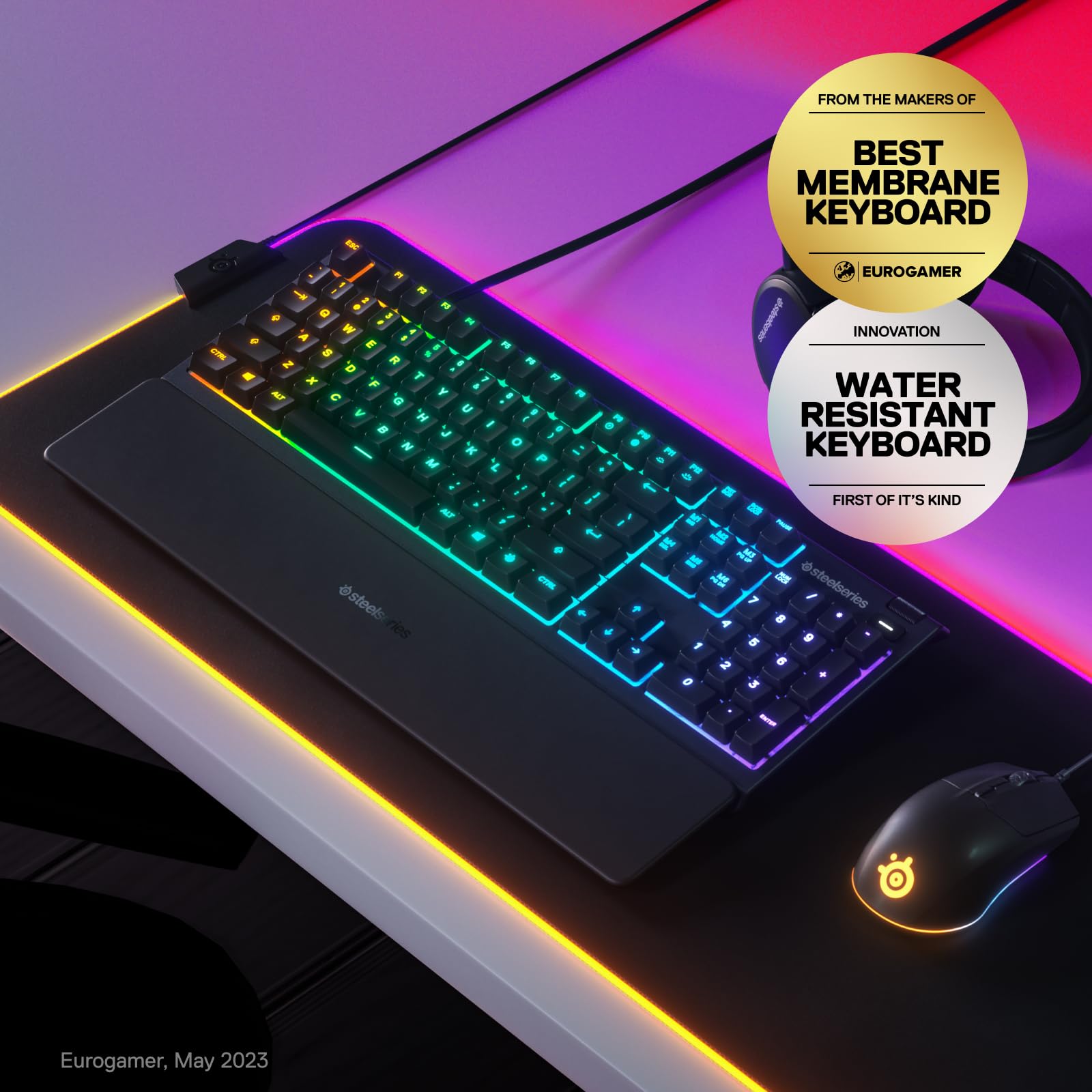 SteelSeries Apex 3 gaming keyboard with RGB backlighting and water resistant design on a gaming desk