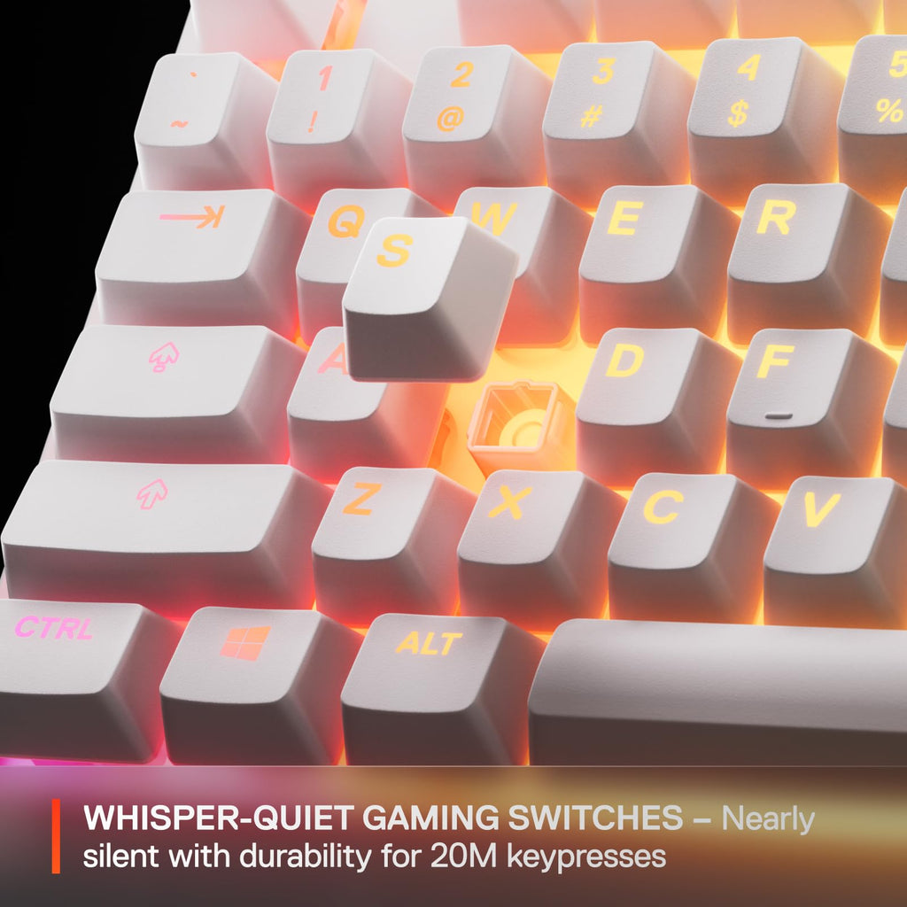 Close-up of white SteelSeries Apex 3 gaming keyboard keys with orange backlight and whisper-quiet gaming switches
