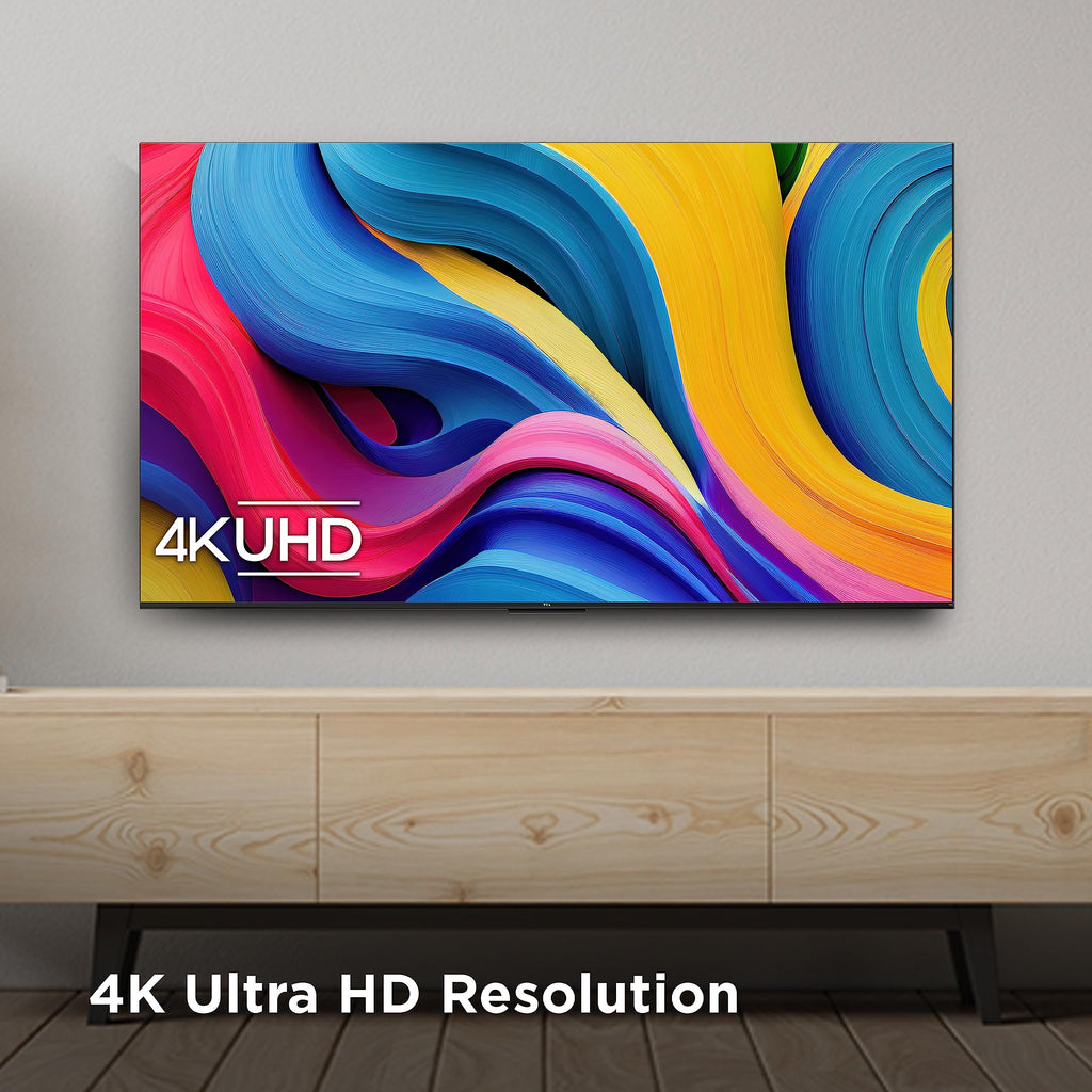 craques TCL 55 inch 4K smart TV mounted on wall with colorful abstract display and 4K Ultra HD resolution