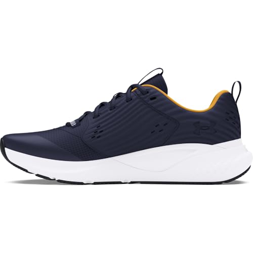 Under Armour Charged Commit 4 sneakers in black with white sole and yellow inner lining for running