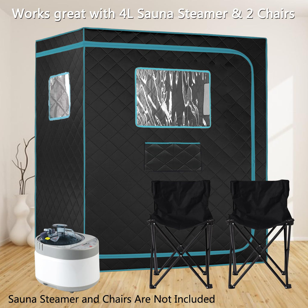 craques full size steam sauna tent with blue trim and two black folding chairs in a room