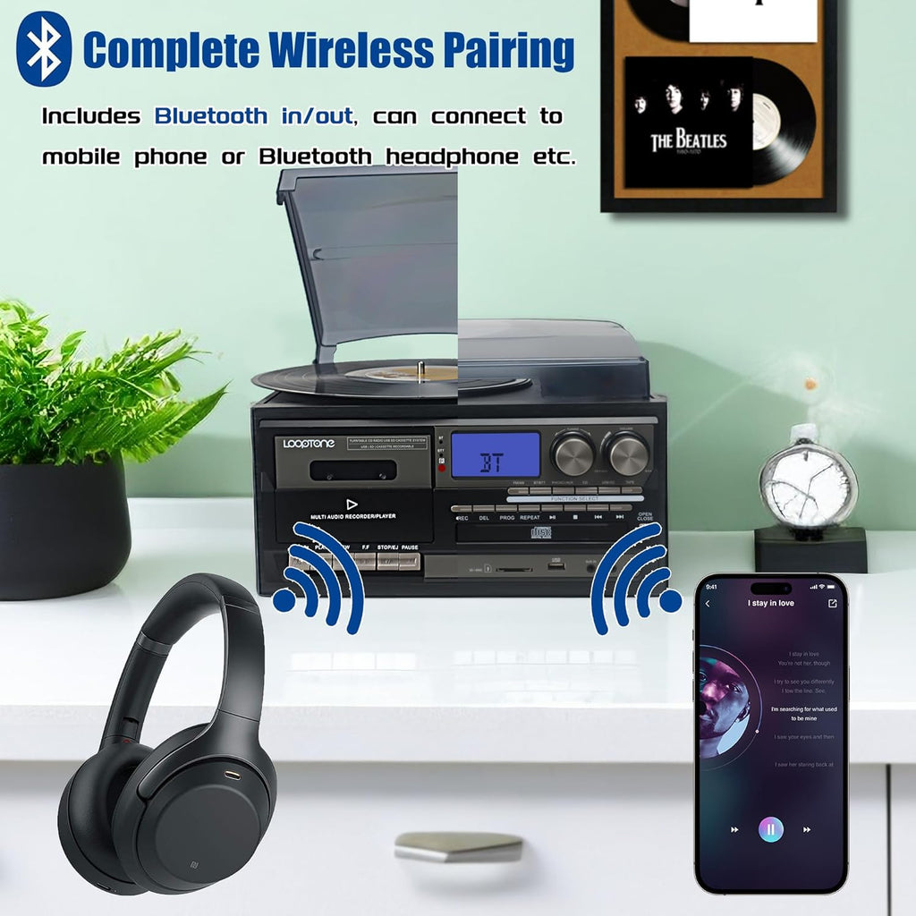 Vintage turntable with bluetooth playing music wirelessly connected to headphones and smartphone