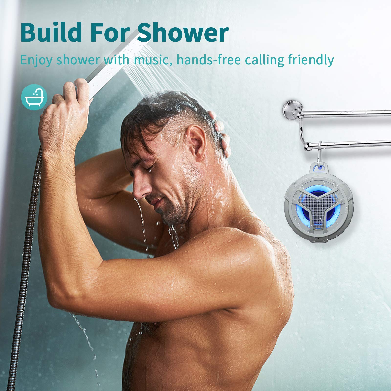 Waterproof Bluetooth shower speaker by craques hanging in shower with man enjoying music under water