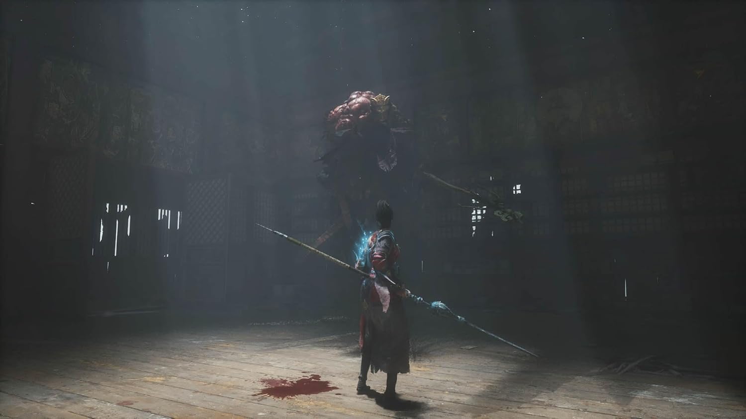 Wuchang Fallen Feathers PS5 gameplay scene with a warrior facing a large glowing enemy in a dark room